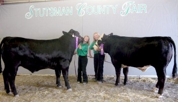 Cheyenne & Bailey with their show steers